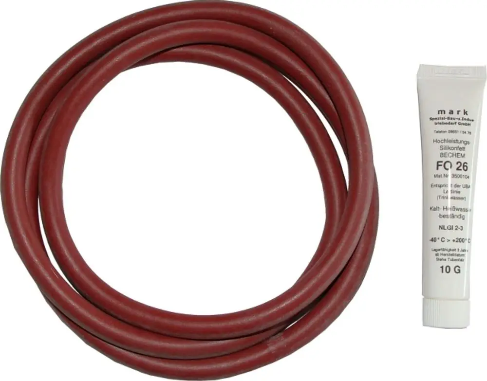 O-Ring in roter Farbe neben einer Tube mit Silikonfett von Wolf. Das Fett ist für Dichtungen und hat eine hohe Temperaturbeständigkeit.